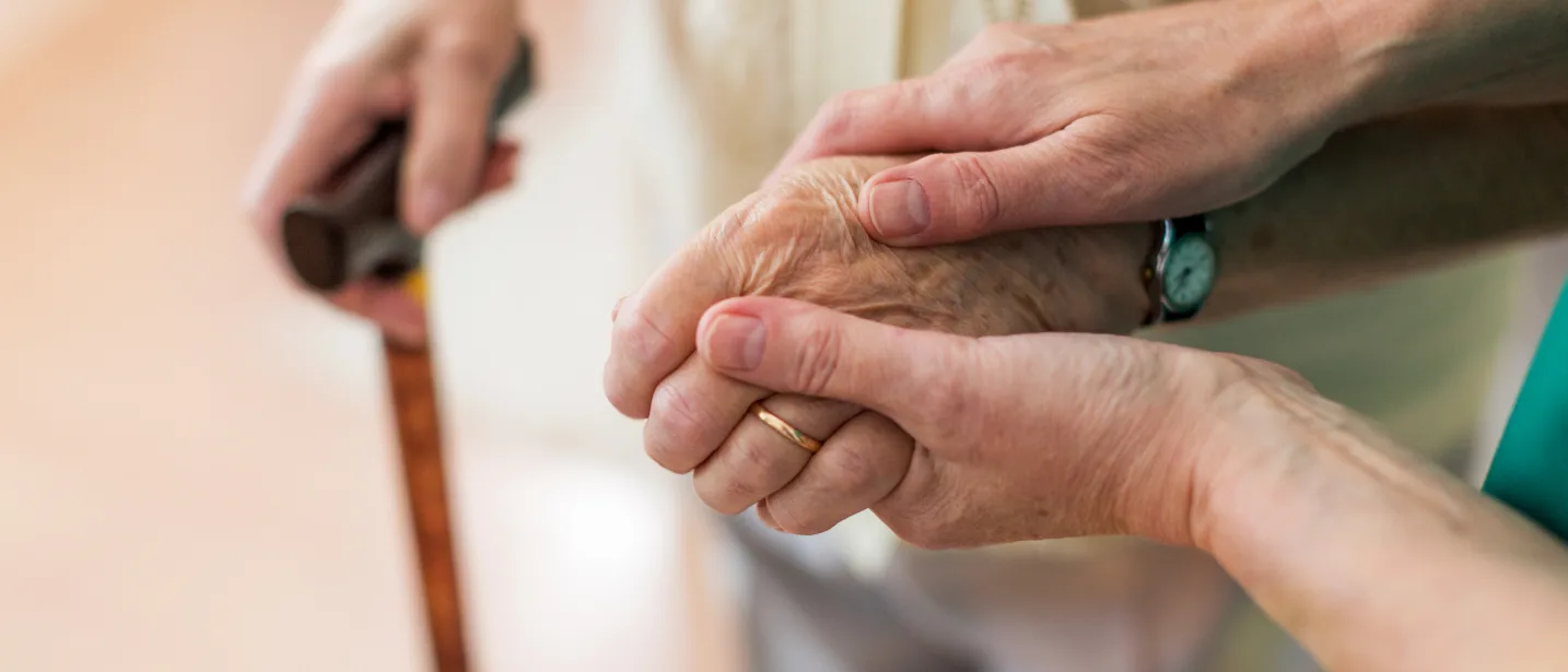 Patient holding phone talking to Nurse